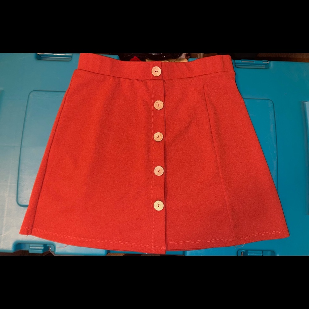 Orange, fitted skirt